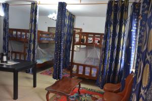 Billede fra billedgalleriet på VICTOR & VICTORY GUEST HOUSE DAMAS-RAIL OBOBOGO Source i Yaoundé