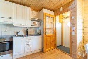 Kuchyň nebo kuchyňský kout v ubytování Holiday in Lapland - Ylläs Iso-Ylläksentie 45 H 10