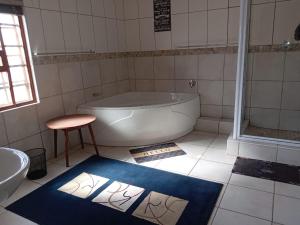 Et badeværelse på The Orchard Addo