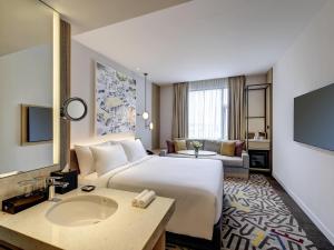 Телевизор и/или развлекательный центр в Mercure Kuala Lumpur Glenmarie