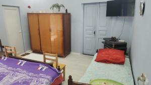 Postel nebo postele na pokoji v ubytování Ana Guest House + 1 fotografie