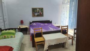 Postel nebo postele na pokoji v ubytování Ana Guest House