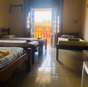 Ένα ή περισσότερα κρεβάτια σε δωμάτιο στο Hotel Porto Arthur
