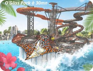 a water slide in the waterpark at the oasis park spa at Gîte Cosy TY CLEM cottage in Mouilleron-le-Captif