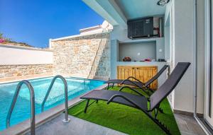 a patio with a swimming pool and a chair next to it at Nice Home In Murter With Private Swimming Pool, Can Be Inside Or Outside in Murter +25 photos