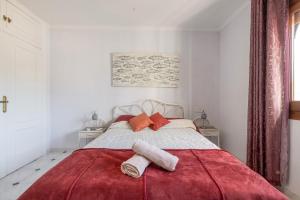 En eller flere senge i et værelse på Villa Paraiso para 6 + 22 billeder