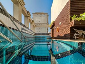Πισίνα στο ή κοντά στο Novotel SP Jardins