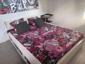 Ένα ή περισσότερα κρεβάτια σε δωμάτιο στο dépendance de la Métairie