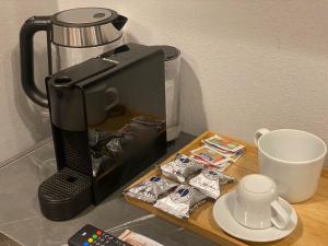 Tetera y cafetera en Empire - Affittacamere