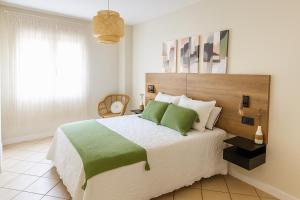 Postel nebo postele na pokoji v ubytování Apartamento Talaia