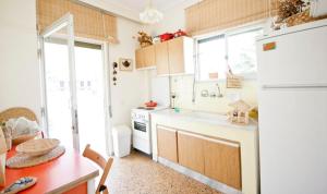 A kitchen or kitchenette at Coral Apartment Még 8 kép
