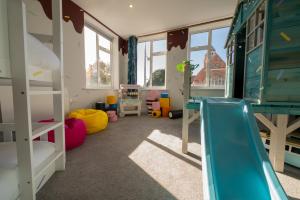 Posezení v ubytování The Sprinkle Pad 3BR Luxury Family Retreat