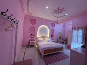 Postel nebo postele na pokoji v ubytování The Niruma Villa