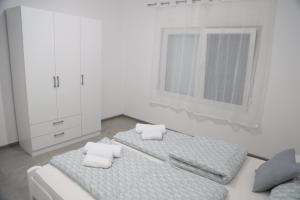 Postel nebo postele na pokoji v ubytování VIA Vasilija