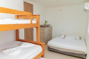 Postel nebo postele na pokoji v ubytování Raíces Caribe 503 + 73 fotografií