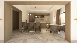 a kitchen and dining room with a table and chairs at Aurelia Apartments in Mama