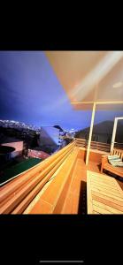 a view of a balcony of a building with a city at Квартира в центре Тбилиси in Tbilisi City