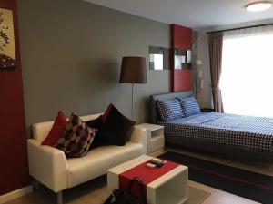 a living room with a couch and a bed at ฺBaan Peang Ploen Hua-Hin by Montri.C in Hua Hin +28 photos
