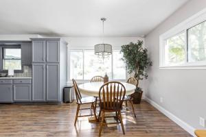 a dining room with a table and chairs at 4Bedroom 2 Bath Home in Arts District-Smoky Row A in Carmel