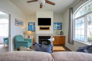a living room with a couch and a tv at Pacific Plaza #504 - Heart of Oceano - 1BdrmD-King in Oceano