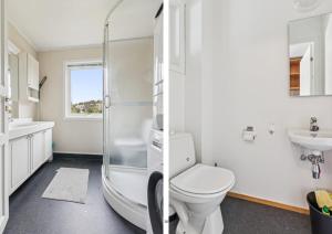 波多Huset i skogskanten i Bodø的带淋浴、马桶和水槽的浴室