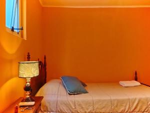 Кровать или кровати в номере Flor de Lino Hotel Porteño +27 фотографий