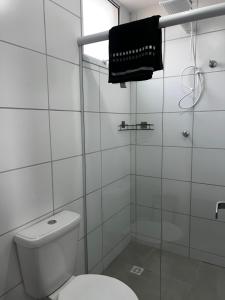 Koupelna v ubytování Condomínio Estância dos Bentos + 12 fotografií
