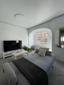Postel nebo postele na pokoji v ubytování Apartamento moderno junto al MUSAC + 25 fotografií