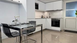 Η κουζίνα ή μικρή κουζίνα στο Modern suite near Corso Buenos Aires Lima Porta Venezia metro +7 φωτογραφίες