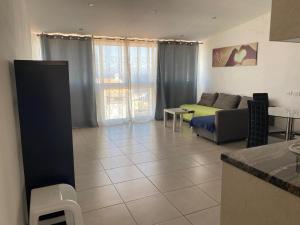 a living room with a couch and a table at Apartamento Callao Salvaje in Callao Salvaje