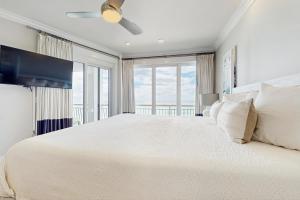 Ένα ή περισσότερα κρεβάτια σε δωμάτιο στο High Pointe E45 +40 φωτογραφίες