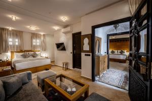 Postel nebo postele na pokoji v ubytování Riad Joy