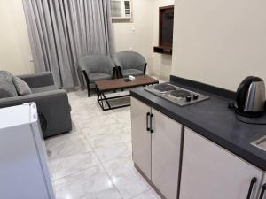 Kuchyň nebo kuchyňský kout v ubytování شقق مملكة كنان النسيم + 10 fotografií