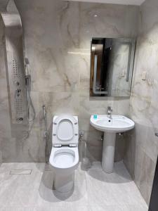 Koupelna v ubytování شقق مملكة كنان النسيم