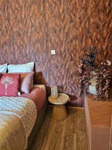 Postel nebo postele na pokoji v ubytování La Parenthèse exotique, duplex cosy à deux pas du lagon