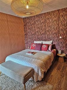 Postel nebo postele na pokoji v ubytování La Parenthèse exotique, duplex cosy à deux pas du lagon