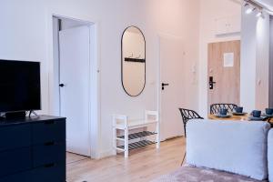 Μια τηλεόραση ή/και κέντρο ψυχαγωγίας στο LAGUNA Apartament Polanica Residence 63-SPA