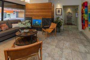 TV a/nebo společenská místnost v ubytování Hotel Don Luis Puerto Montt