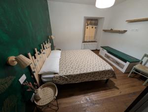 Postel nebo postele na pokoji v ubytování B&B da Nonna Liana