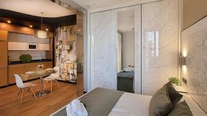 Kuchyňa alebo kuchynka v ubytovaní Apartamentos Suites Oficentro Deluxe