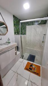 a bathroom with a shower and a sink and a counter at CENTRO DO PELOURINHO in Salvador