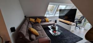 Posezení v ubytování Luxuriöse Maisonette Wohnung mit Whirlpool und Weitblick im Kurviertel von Bad Salzuflen