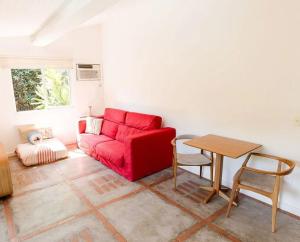 Χώρος καθιστικού στο Refúgio no Jd. Botânico - Piscina, Sauna e Natureza