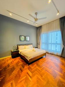 a bedroom with a bed and a wooden floor at Luxury Suites At The Mews KLCC in Kuala Lumpur +93 photos