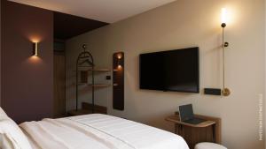 Μια τηλεόραση ή/και κέντρο ψυχαγωγίας στο Hotel 2M, The Originals Relais