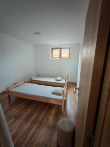 Ένα ή περισσότερα κρεβάτια σε δωμάτιο στο Galanta Apartment Zlatibor