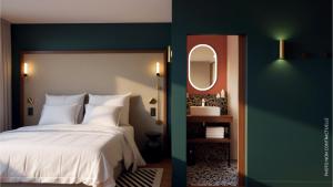Ένα ή περισσότερα κρεβάτια σε δωμάτιο στο Hotel 2M, The Originals Relais