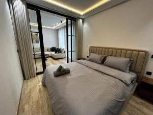 Ένα ή περισσότερα κρεβάτια σε δωμάτιο στο Prestige Aman