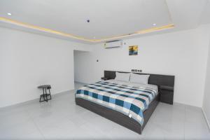 Postel nebo postele na pokoji v ubytování Mabiza Apartments