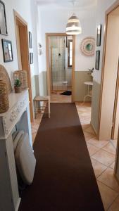 a living room with a hallway with a rug at Beas Ferienglück in Busenberg +40 photos